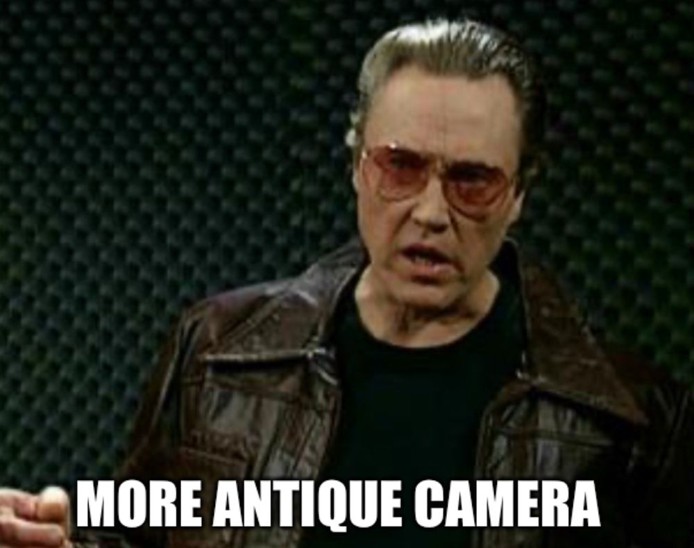 Image of actor Christopher Walken from the famous Saturday Night Live sketch “More Cowbell,” but with a caption reading “More Antique Camera.”