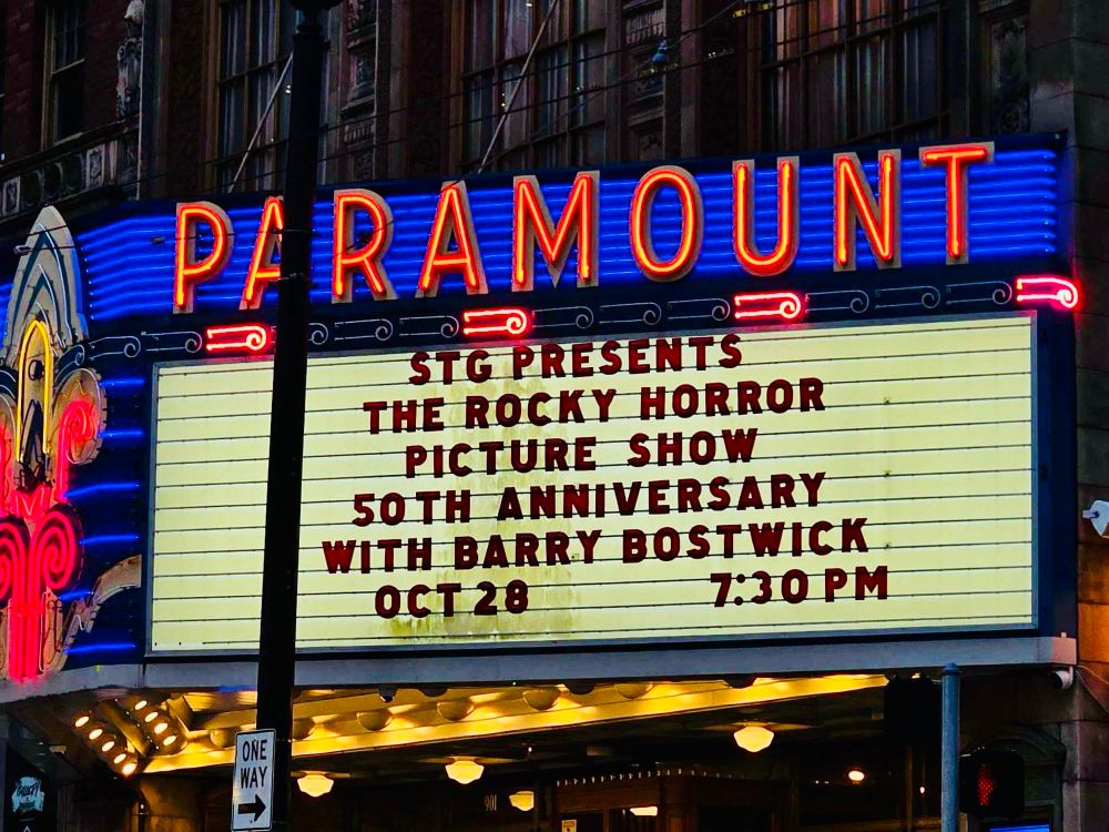 Theater sign reads:

PARAMOUNT
STG PRESENTS
THE ROCKY HORROR PICTURE SHOW
50TH ANNIVERSARY
WITH BARRY BOSTWICK
OCT 28
7:30 PM