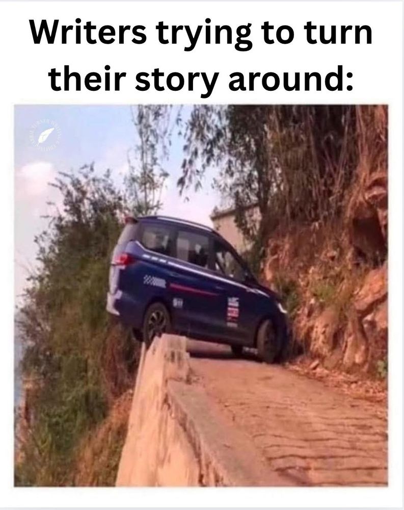 Tiny blue car turned sideways on a narrow mountain road, the back wheels and trunk stuck on a low wall that blocks a straight cut-off, the front pushed into the side of the mountain with the wheels slightly turned as if it can straighten up.