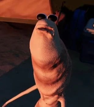 Screenshot of Marcus the Worm, a VR chat character who does not look very much like a worm. He does have a thick neck leading up to a face with no distinct place the neck transitions into a head. He has two bulging eyes on the top of his head and an unsettlingly humanlike mouth, with no other facial features. 