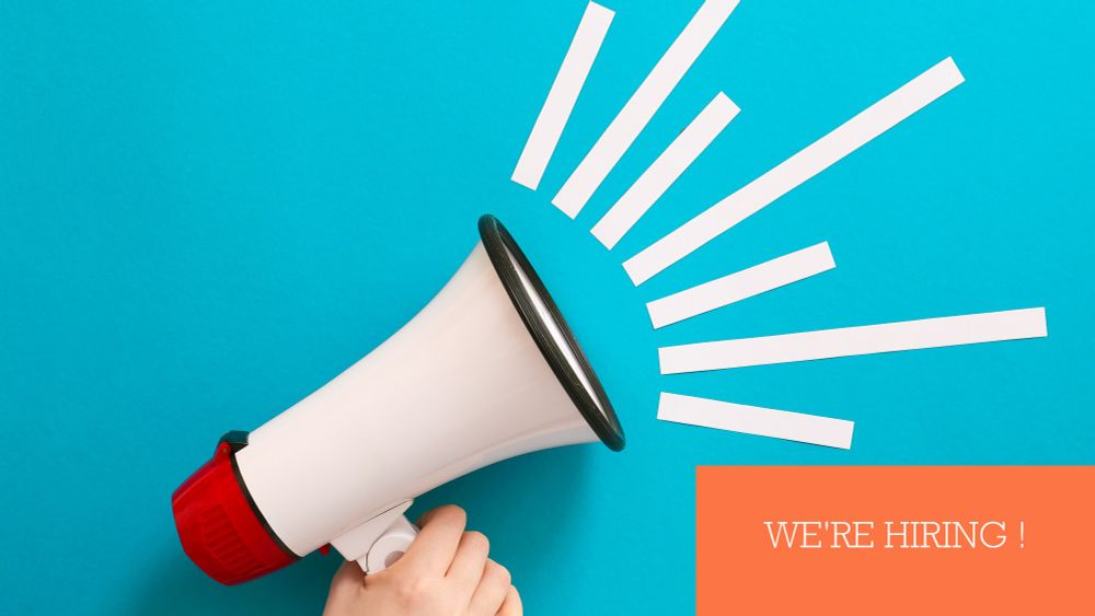 Image of a megaphone. Text in orange box says 'we're hiring!'