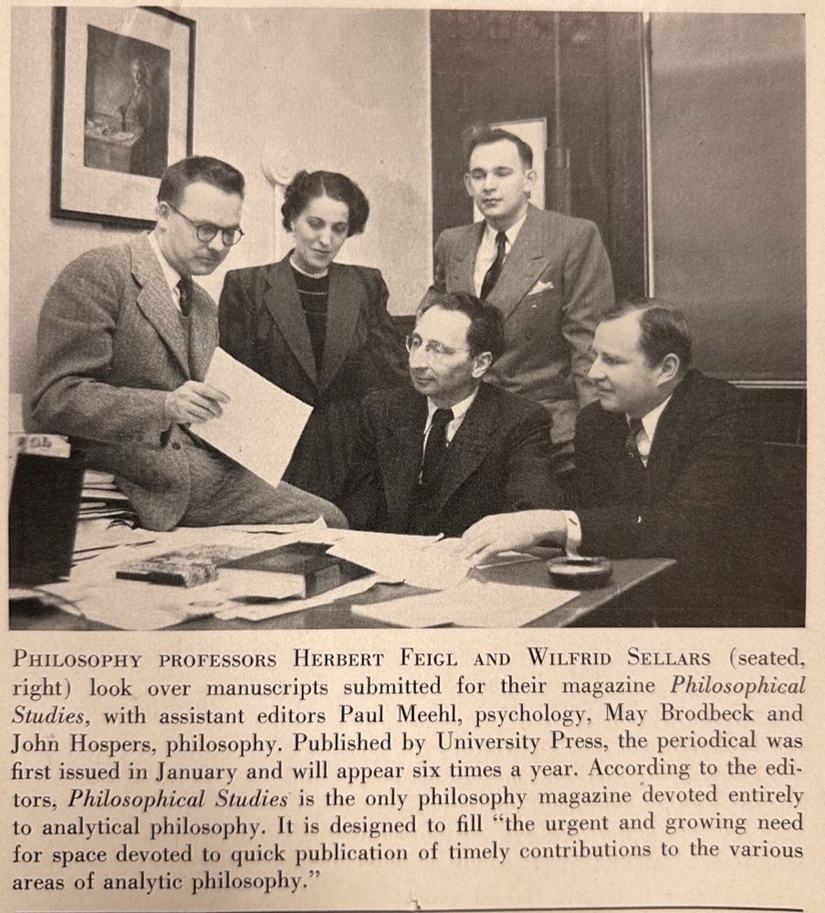 Black-and-white image of five people in an office looking at pages on a desk. Caption below the image reads: “PHILOSOPHY PROFESSORS HERBERT FEIGL AND WILFRID SELLARS (seated, right) look over manuscripts submitted for their magazine Philosophical Studies, with assistant editors Paul Meehl, psychology, May Brodbeck and John Hospers, philosophy. Published by University Press, the periodical was first issued in January and will appear six times a year. According to the edi-tors, Philosophical Studies is the only philosophy magazine devoted entirely to analytical philosophy. It is designed to fill ‘the urgent and growing need for space devoted to quick publication of timely contributions to the various areas of analytic philosophy.’”