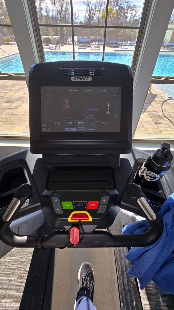 A picture looking down on a treadmill as Michael slays every runway challenge that comes across his Spotify Playlist 