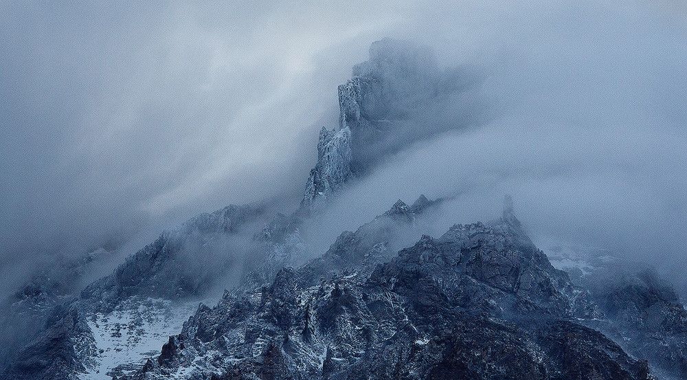 There is so much fleeting beauty to the world of mountains, lasting seconds before it's gone forever. Far above, barely visible, the peak of Paine Grande in Chile's Torres del Paine is transformed into a moment of utter beauty!