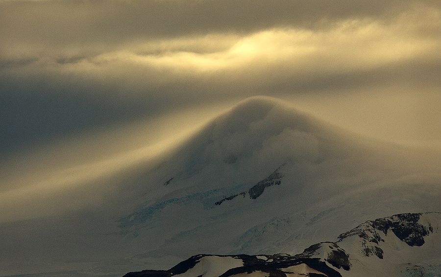 I have always been mesmerized by the soft, ethereal light that seems to emanate from glaciers and touches all that is nearby. This particular evening in Patagonia's Torres del Paine National Park, it all came together. The warm light of the sun intermittently broke through clouds, gracing the peak of a mountain right next to glacier Grey in some of the most beautiful, evocative light I have seen.