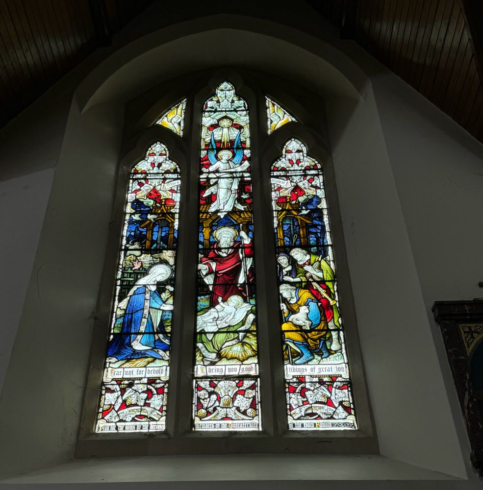 Adoration of the shepherds, seen lower right, angel above Joseph & baby centre. Mary lower left