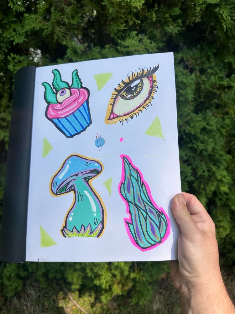 Brightly colored doodles of a tentacle cupcake, eye, mushroom