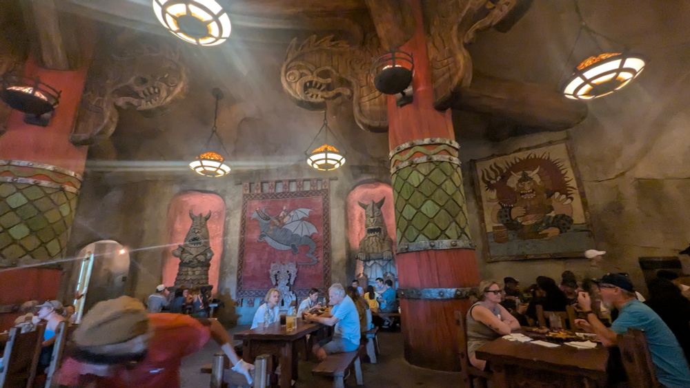 Mead Hall in Epic Universe with tapestries and themed architecture for How To Train Your Dragon