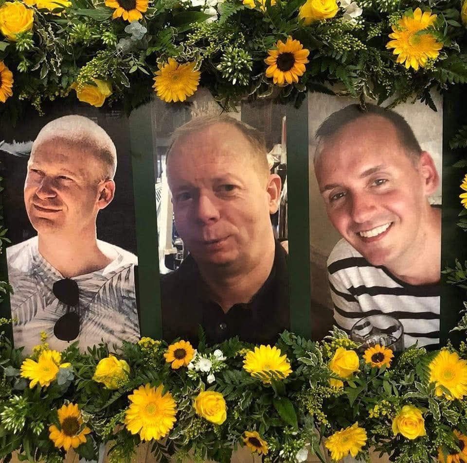 Portrait photographs of three smiling men, surrounded by greenery and yellow flowers.