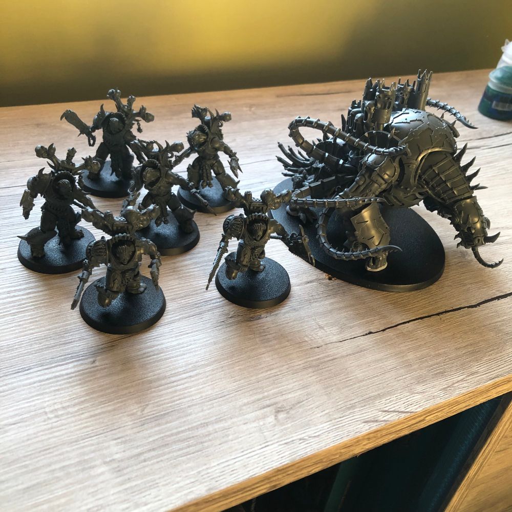 Khorne Eightbound and a Maulerfiend assembled and unpainted. 