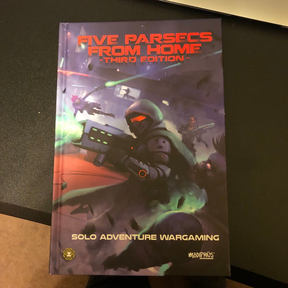 Five parsecs from home rulebook for some solo adventure gaming. 