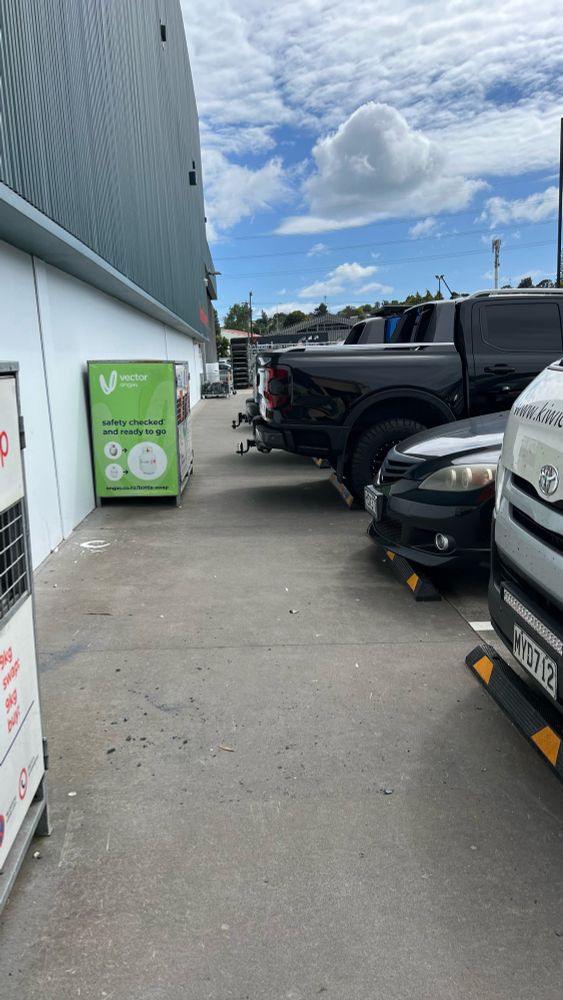 Two ford ranger utes blocking the pavement