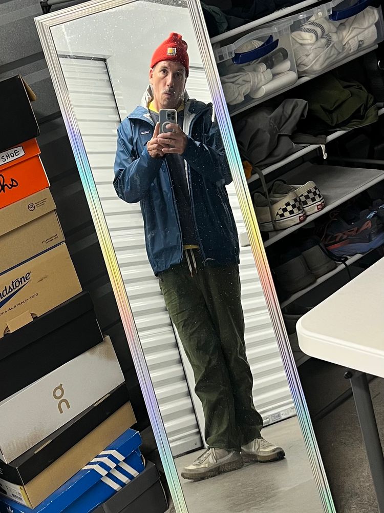 A mirror selfie of yours truly. I’m wearing a colorful outfit. 