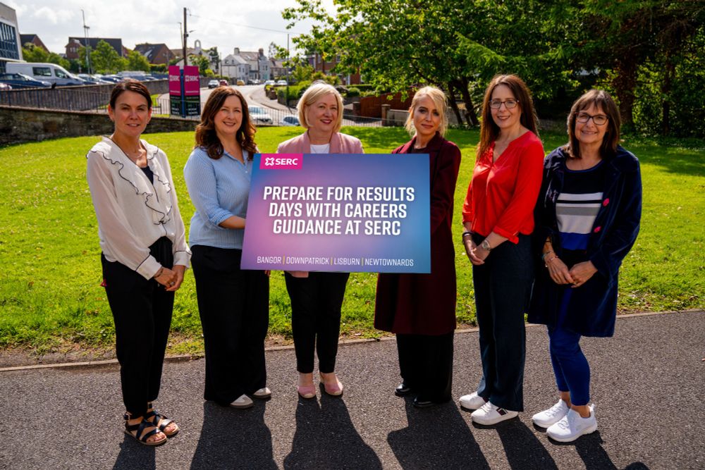 SERC Careers advisors holding sign