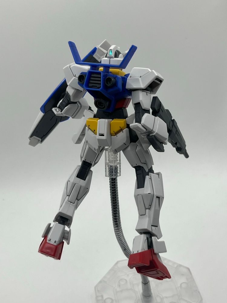 Back of AGE-1 as she faces an larger enemy that isn’t there