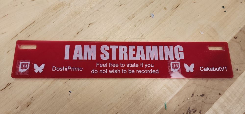'I am streaming' red acrylic sign