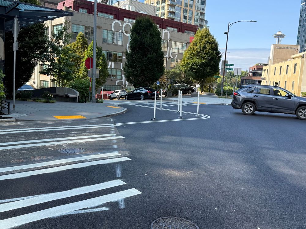 Extending the corner of Lenora and Boren on Denny with paint and posts