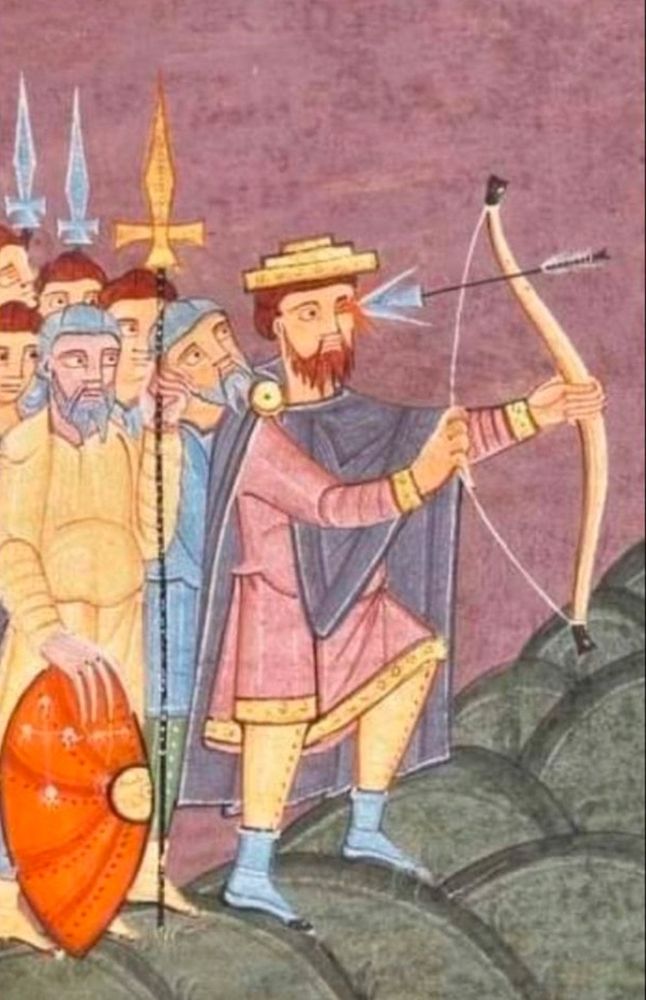 Medieval painting of a group of warriors, one of whom is an archer with a bow, but with an arrow stuck in his eye.