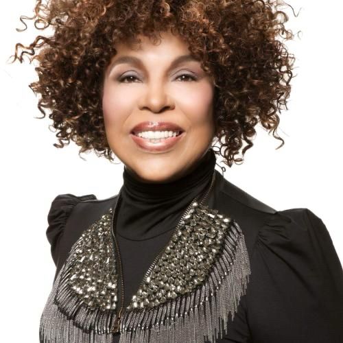 A photo of Roberta Flack, wearing Black 