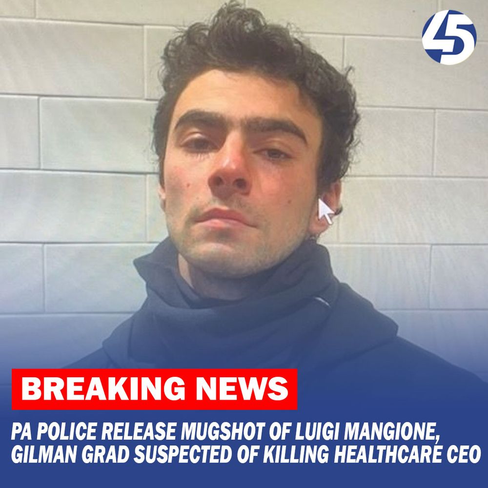 The mugshot of Luigi Mangione, who is looking into the camera