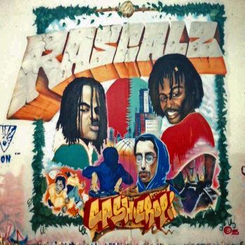 The photo depicts a colorful graffiti-style artwork featuring two prominent figures with dreadlocks, one in a green shirt and the other in a red shirt, set against a cityscape background. The artwork includes bold text at the top reading 