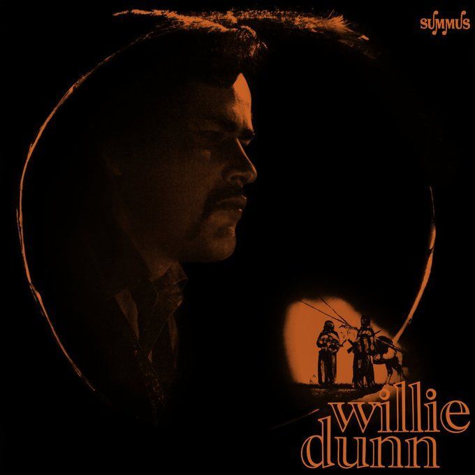 Orange-tinted illustration of Willie Dunn in profile view, with dark hair and a mustache, eyes closed and head slightly bowed, framed by a large glowing circular halo against a black background. Inside the lower part of the circle, a small scene shows two figures in traditional attire standing beside a horse. The word "summus" is in the top right corner, and "Willie dunn" is written in large, stylized lettering at the bottom.