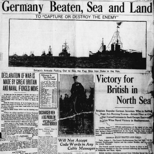 Black-and-white image of a newspaper front page with the main headline "Germany Beaten, Sea and Land" above the subheadline "To 'Capture or Destroy the Enemy'". Below is a photograph of a fleet of warships on the sea, captioned "Britain's Armada Putting Out to Sea. The Flag Ship Iron Duke in the Van." Additional headlines include "Declaration of War is Made by Great Britain and Naval Forces Move", "Victory for British in North Sea", "Belgians Repulse German Invaders Who in Baffle Rage Are Burning Towns---British Fleet at Gibraltar Halter Forced Germans to Seek Escape Eastward---France Wins Naval Victory in Mediterranean.", "Discharged Men a Big Problem Across Border", "Sir John French Commanded the British Army. Will Not Accept Code Words in Any Cable Messages.", and other smaller articles and sidebars about war-related events.