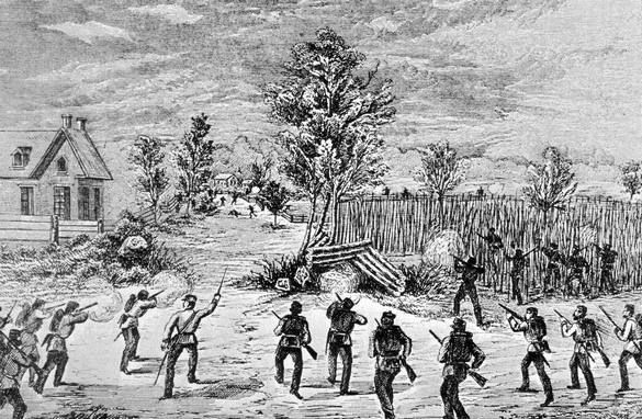 The image is a black-and-white historical illustration depicting a battle scene. A group of soldiers, dressed in 19th-century military uniforms with hats and carrying rifles, is engaged in combat. Some soldiers are firing their weapons, while others appear to be advancing or taking cover. They are facing an enemy force positioned behind a wooden barricade, with smoke indicating gunfire. The setting is rural, featuring a small house with a pitched roof on the left, scattered trees, and a cloudy sky above. The scene captures the intensity of a skirmish, likely from a historical conflict such as the American Civil War.