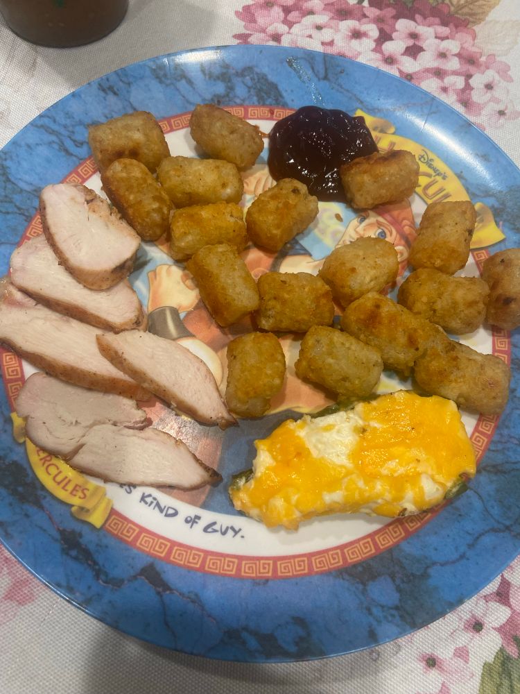 grilled chicken with tater tots and a cheese stuffed jalapeño 