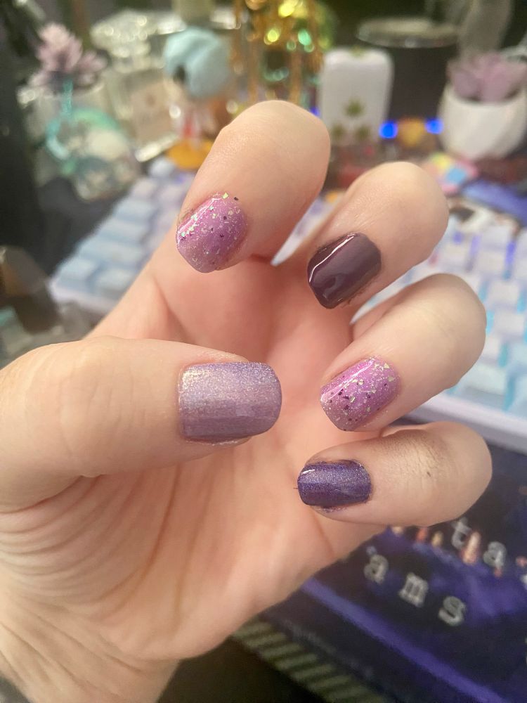 my nails in various shades of purple 