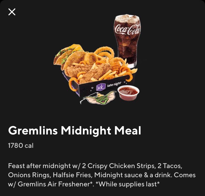 jack in the box menu item called gremlins midnight meal with 2 crispy chicken strips, 2 tacos, onion rings, halfsie fries, sauce and a drink and comes with a gremlins air freshener 