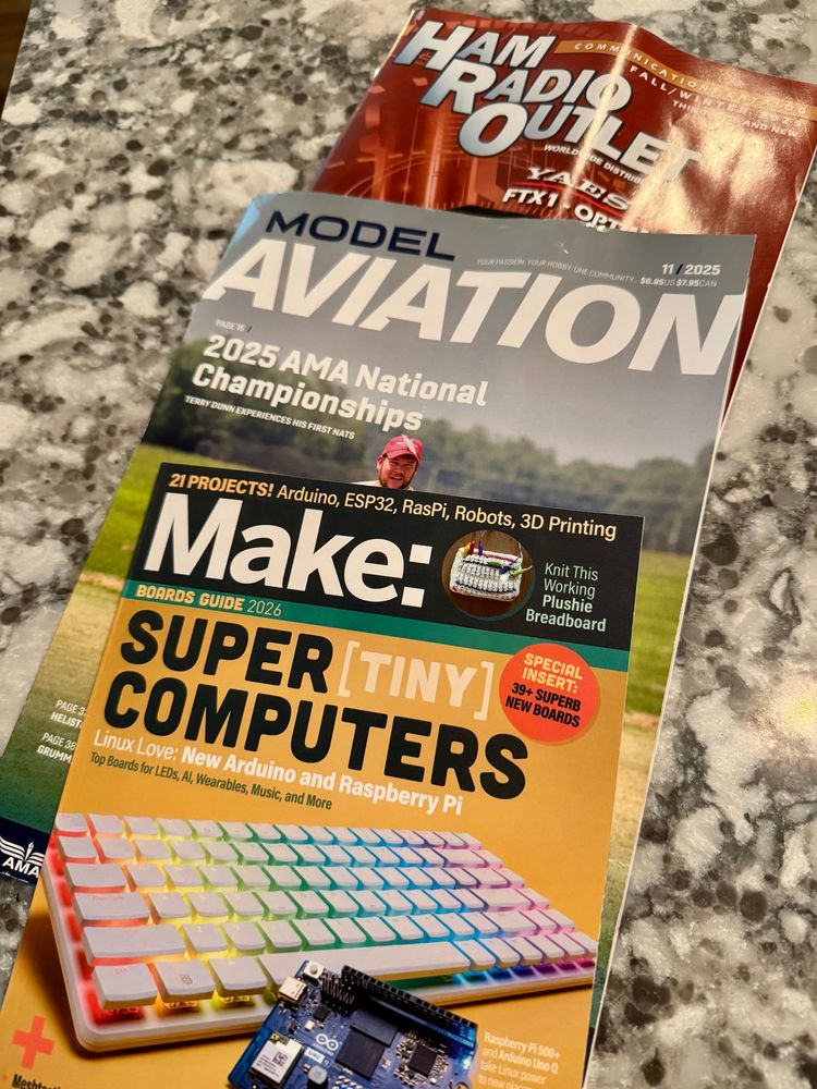 a ham radio outlet catalog, a ln issue of model aviation, and an issue of make magazine