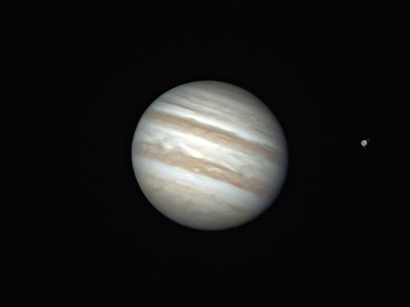 Jupiter with loads of fine detail in the clouds. Its moon Ganymede is to the right and you can even glimpse some surface detail on it!!!
