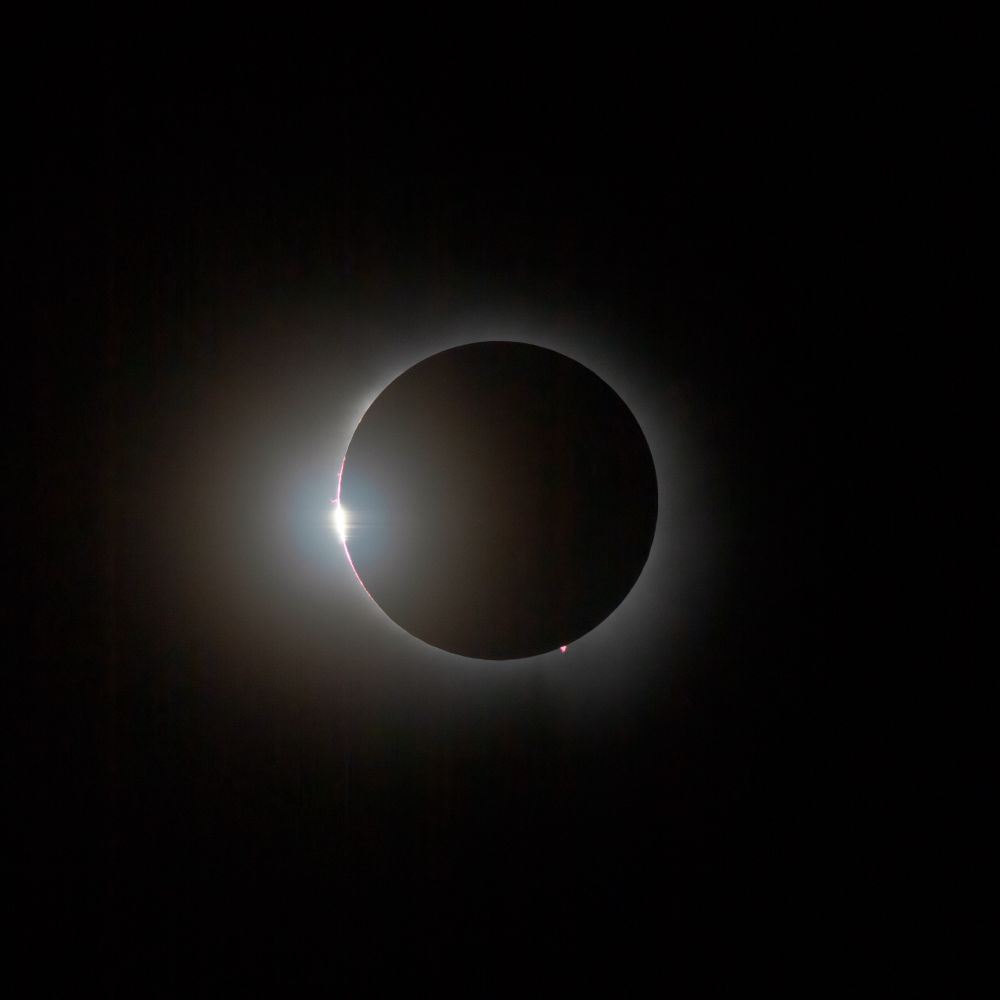Sun just peaking over side brightly for diamond ring effect