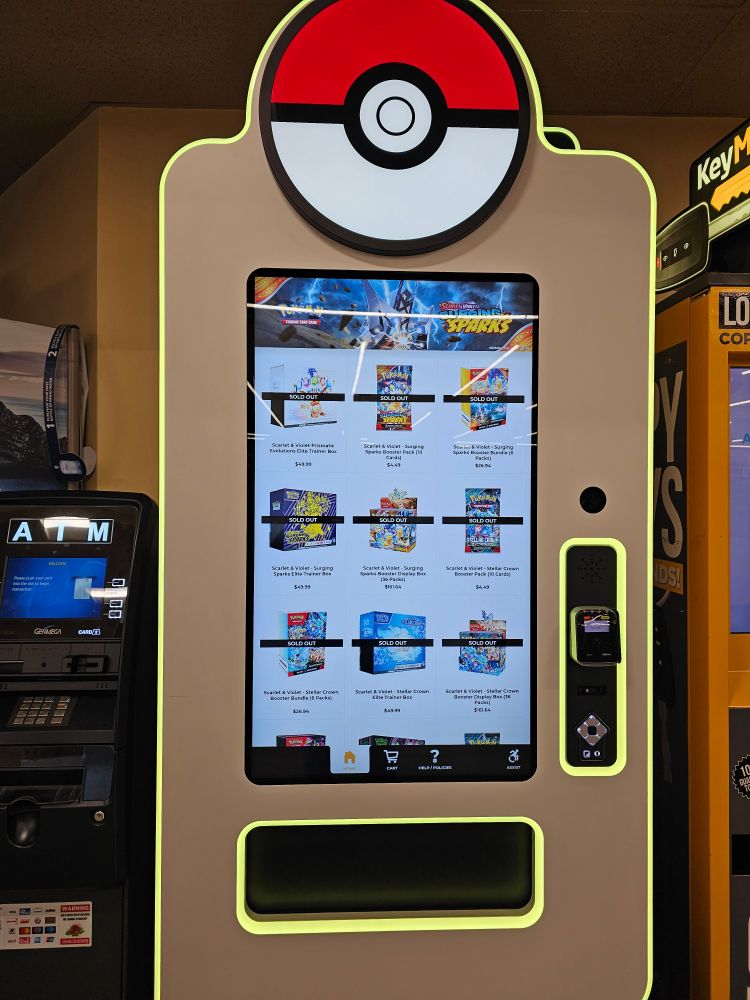 A Pokémon card vending machine, but none of the cards were left.