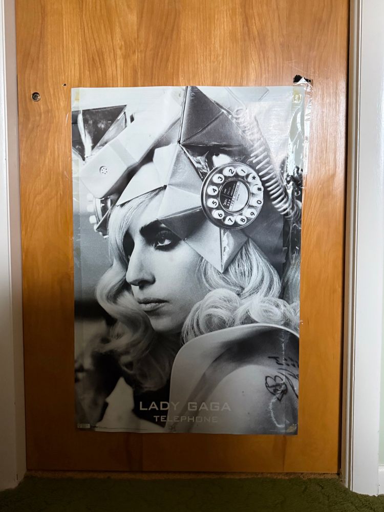 Lady Gaga poster taped to bedroom door