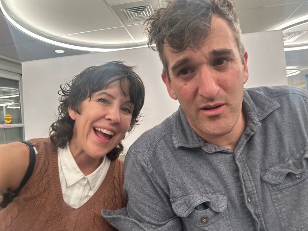 Selfie of me in pain and wife maniacally grinning. 