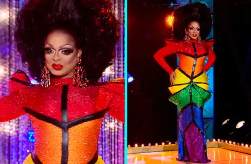 Kennedy Davenport wears a structured, floor-length gown with rainbow sequin panels divided by black piping. The dress has sharp shoulders and a fitted silhouette. She wears large red earrings and voluminous dark brown hair styled high.