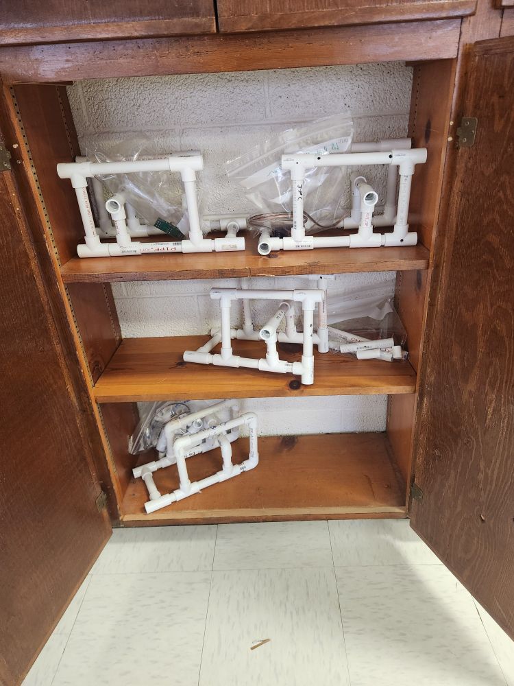 The PCB frames of the underwater ROVs. It's a team of three kids per ROV. They measured and cut and put the PVC together. 