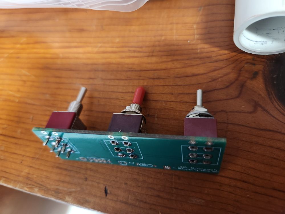 Side view of the switches in their circuit board. 5th graders did this, one person per switch.