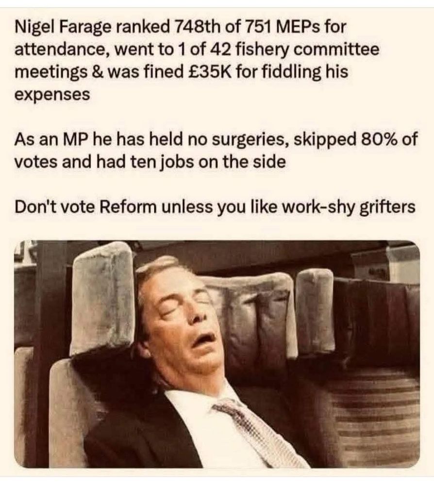 Nigel Farage asleep in a chair with his mouth hanging wide open.