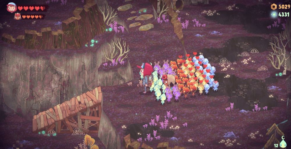 A scene from the game, "The Wild at Heart", where the main characters, Wake and Kirby, are leading a variety of Spritelings, which are little spirit creatures that roam the woods.