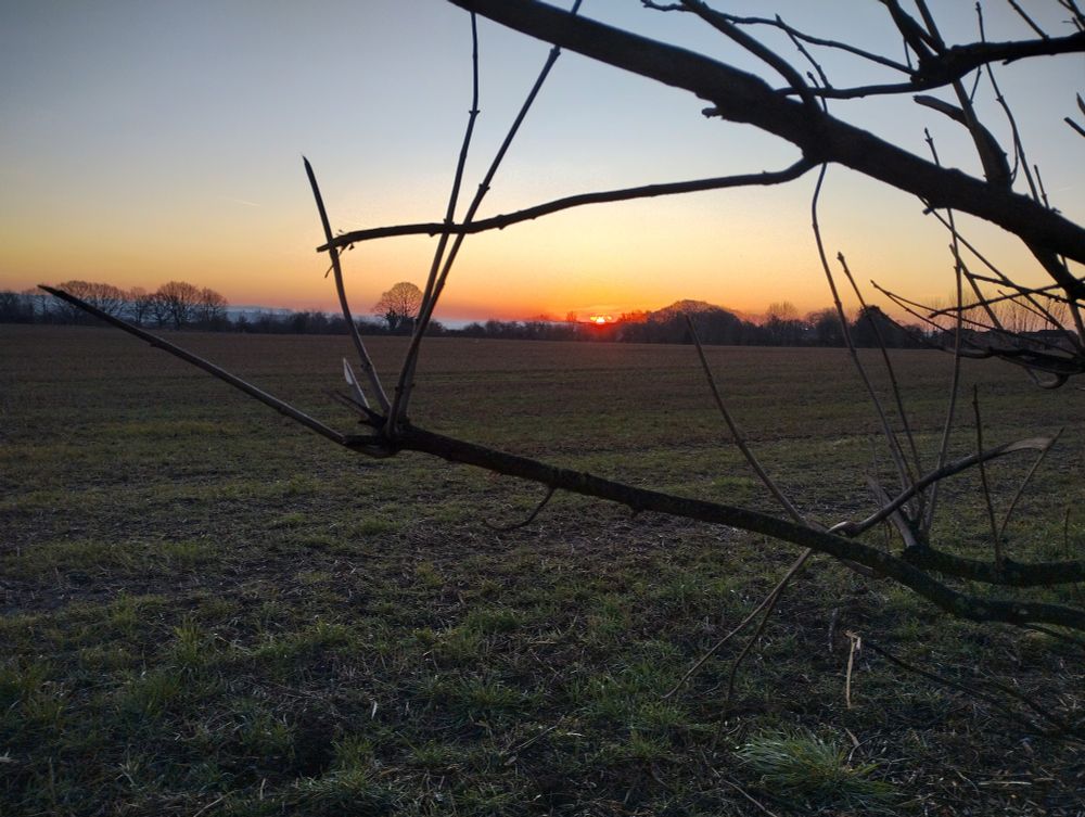 A low chilly sunrise over fields
