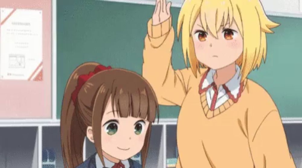 two anime girls are standing next to each other in front of a green board with a certificate on it