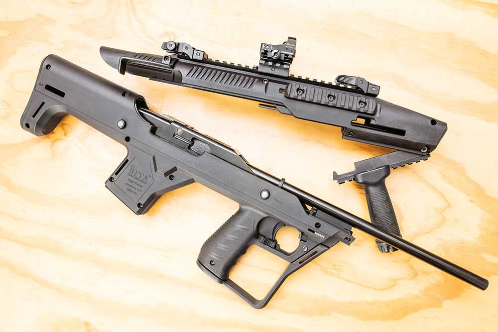 The gun broken open so you can see where the origins came from. The receiver and barrel are the normal Hi Point Carbine receiver shrouded with injection molded plastic pieces.