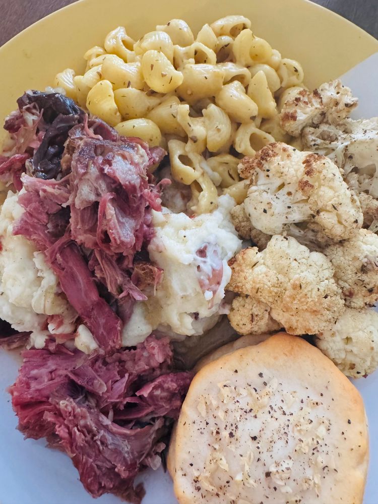 Smoked turkey necks + roasted cauliflower + garlic parmesan mashed potatoes + truffle mac and cheese. And a biscuit. 