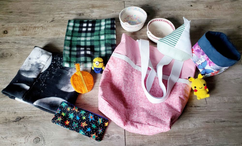 Group shot of all of the gifts from this thread together in one photo. What a labor of love this all was. I learned a lot. Had lots of fun. I think they all look great. :)