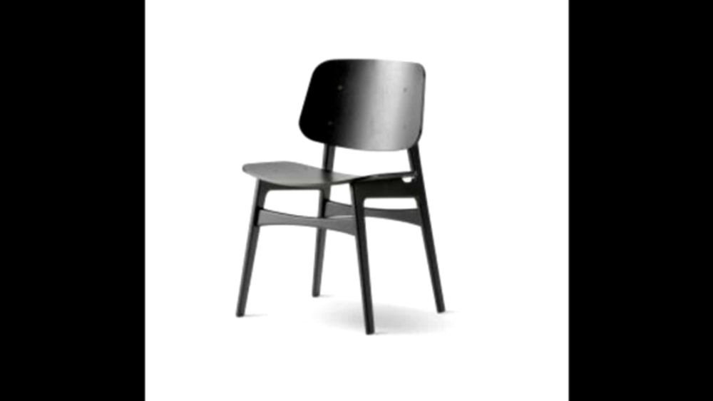 a black chair with a wooden seat and back is on a white background