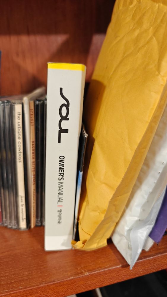 A booklet that says Soul Owner's Manual with some Korean characters 