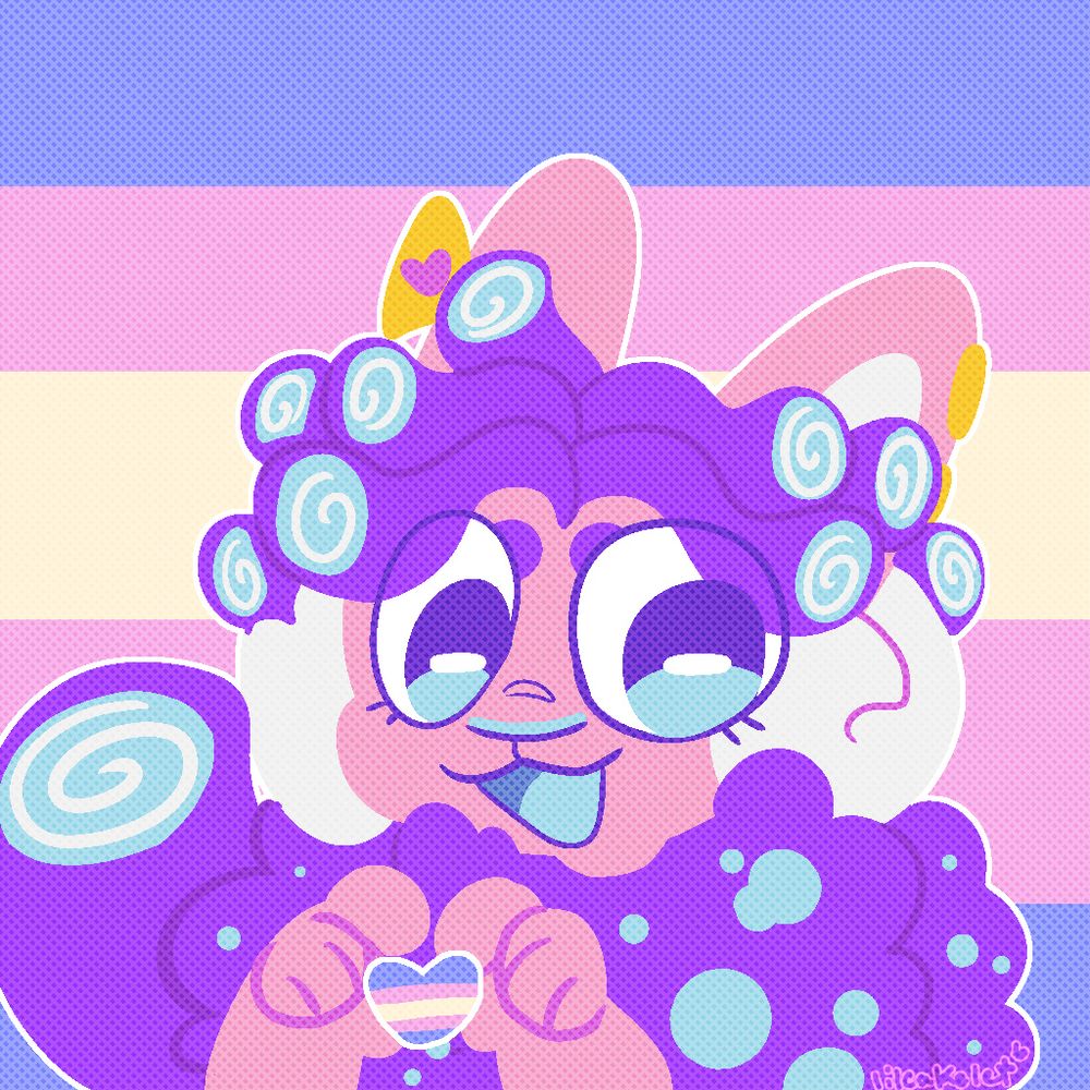 cake in the t4t flag palette, he makes a  heart shape with is fingers and in the middle is a heart with the trans flag. the background is the same flag